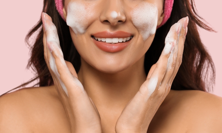 Woman washing face